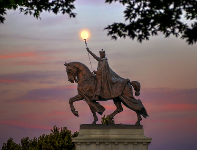 The moon over the Apotheosis of St. Louis statue of King Louis IX of France, namesake of St. Louis, Missouri in Forest Park, St. Louis, Missouri. The moon over the Apotheosis of St. Louis statue of King Louis IX of France, namesake of St. Louis, Missouri in Forest Park, St. Louis, Missouri.