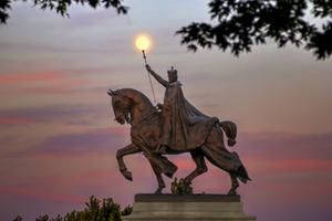 The moon over the Apotheosis of St. Louis statue of King Louis IX of France, namesake of St. Louis, Missouri in Forest Park, St. Louis, Missouri. The moon over the Apotheosis of St. Louis statue of King Louis IX of France, namesake of St. Louis, Missouri in Forest Park, St. Louis, Missouri.