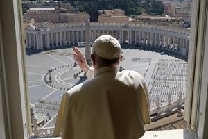 Pope Francis blesses an empty St. Peter's Square. Pope Francis blesses an empty St. Peter's Square.