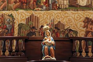 The sanctuary of the oldest church in Florida welcomes pilgrims to prayer and beckons reflection before a statue of the Blessed Mother. The sanctuary of the oldest church in Florida welcomes pilgrims to prayer and beckons reflection before a statue of the Blessed Mother.