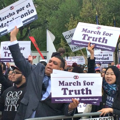 Crowds hold signs in defense of traditional marriage at the March for Marriage in Washington on Saturday. Crowds hold signs in defense of traditional marriage at the March for Marriage in Washington on Saturday.