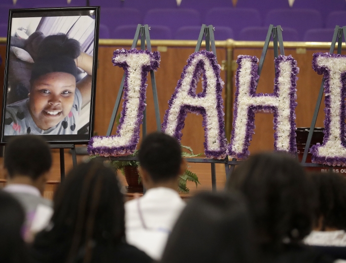 A photo of Jahi McMath is shown at funeral services for McMath at Acts Full Gospel Church in Oakland, California, July 6. Dozens of family members, friends and other mourners filled the Northern California church for the funeral of the teenage girl at the center of a medical and religious debate over brain death.
A photo of Jahi McMath is shown at funeral services for McMath at Acts Full Gospel Church in Oakland, California, July 6. Dozens of family members, friends and other mourners filled the Northern California church for the funeral of the teenage girl at the center of a medical and religious debate over brain death.