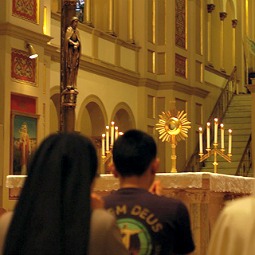 Participants praying at a July 27 World Youth Day-inspired event in Washington, D.C. Participants praying at a July 27 World Youth Day-inspired event in Washington, D.C.