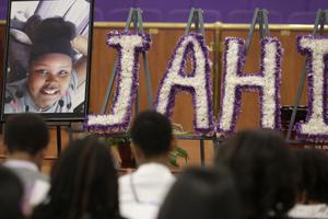 A photo of Jahi McMath is shown at funeral services for McMath at Acts Full Gospel Church in Oakland, California, July 6. Dozens of family members, friends and other mourners filled the Northern California church for the funeral of the teenage girl at the center of a medical and religious debate over brain death.
A photo of Jahi McMath is shown at funeral services for McMath at Acts Full Gospel Church in Oakland, California, July 6. Dozens of family members, friends and other mourners filled the Northern California church for the funeral of the teenage girl at the center of a medical and religious debate over brain death.
