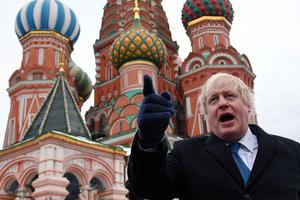 Boris Johnson stands in front of Saint Basil’s cathedral in Moscow, Dec. 22, 2017.