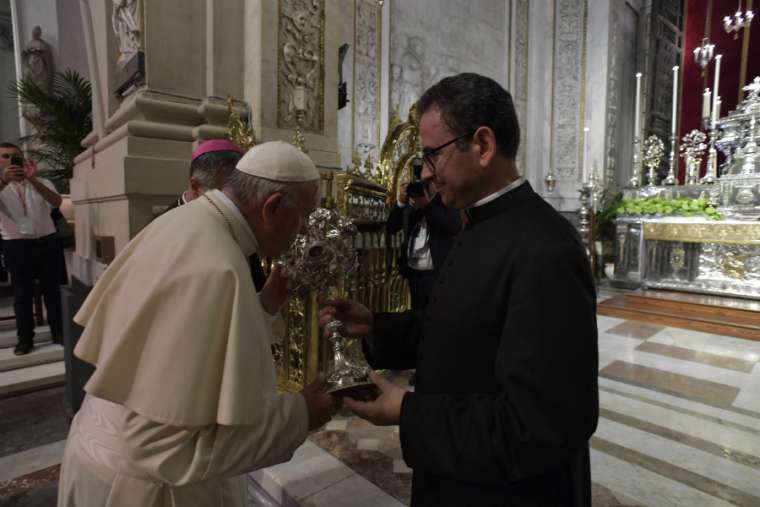 Pope Francis venerates a relic at the Palermo cathedral during his meeting with clerics, religious and seminarians Sept. 15. Pope Francis venerates a relic at the Palermo cathedral during his meeting with clerics, religious and seminarians Sept. 15.