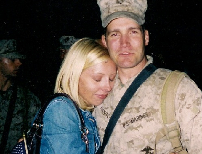 J.J. Hanson hugs his wife, Kristen, upon his return from a combat tour in Iraq J.J. Hanson hugs his wife, Kristen, upon his return from a combat tour in Iraq