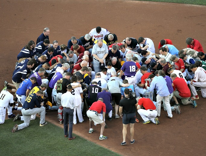Members of the Republican and Democratic congressional baseball teams gather for prayer before the start of the Congressional Baseball Game at Nationals Park on June 15 in Washington. U.S. House Majority Whip Rep. Steve Scalise, R-Louisiana, remained in critical condition following a shooting June 14 during a Republican congressional baseball team practice. Members of the Republican and Democratic congressional baseball teams gather for prayer before the start of the Congressional Baseball Game at Nationals Park on June 15 in Washington. U.S. House Majority Whip Rep. Steve Scalise, R-Louisiana, remained in critical condition following a shooting June 14 during a Republican congressional baseball team practice.