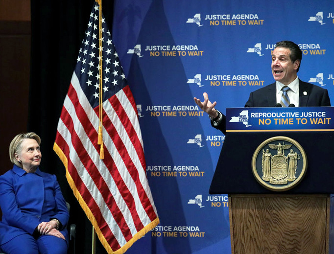 Former presidential candidate Hillary Clinton looks on as New York Governor Andrew Cuomo speaks at a pro-abortion event Jan. 7, 2019, in New York City. The two Democrats shared the stage to promote the Reproductive Health Act in New York, which Cuomo wants the State Legislature to pass in their first 30 days. Former presidential candidate Hillary Clinton looks on as New York Governor Andrew Cuomo speaks at a pro-abortion event Jan. 7, 2019, in New York City. The two Democrats shared the stage to promote the Reproductive Health Act in New York, which Cuomo wants the State Legislature to pass in their first 30 days.