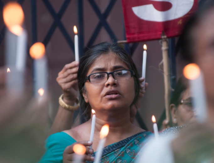 People hold candles during a rally to protest the sexual assault of a 70 year old nun in Kolkata, India on March 18, 2015. People hold candles during a rally to protest the sexual assault of a 70 year old nun in Kolkata, India on March 18, 2015.