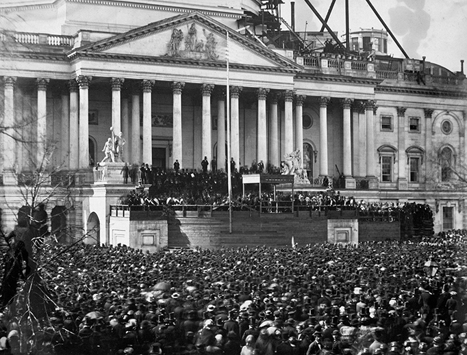A crowd gathers at the first inauguration of President Abraham Lincoln on Marcy 4, 1861 — the first presidential inauguration ever photographed — at the U.S. Capitol, Washington, D.C. A crowd gathers at the first inauguration of President Abraham Lincoln on Marcy 4, 1861 — the first presidential inauguration ever photographed — at the U.S. Capitol, Washington, D.C.