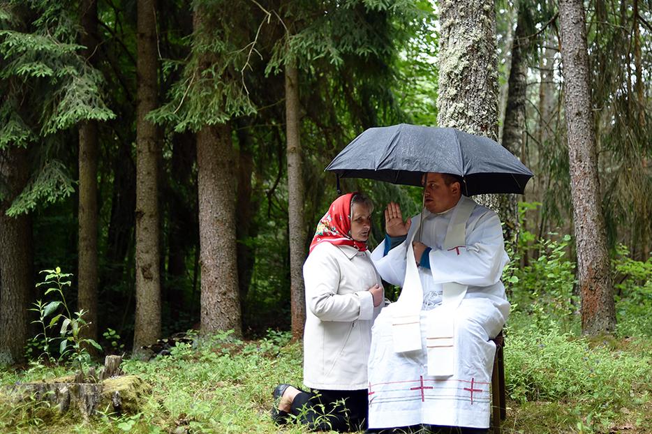 Above, a Catholic priest hears a confession during the annual Mother of Perpetual Help in the forest near the village of Dubok, Belarus, on July 1, 2018.
Above, a Catholic priest hears a confession during the annual Mother of Perpetual Help in the forest near the village of Dubok, Belarus, on July 1, 2018.