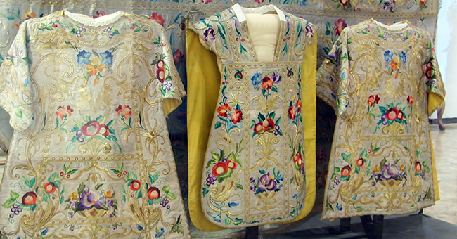 A chasuble between two dalmatics in the Museo del Carmen de Maipú, Santiago de Chile A chasuble between two dalmatics in the Museo del Carmen de Maipú, Santiago de Chile