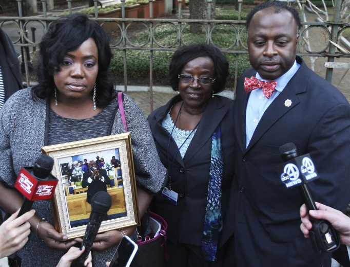 Family of the late Daniel Simmons Sr. — Rose Simmons, left, daughter; former wife Annie Simmons; and son Daniel L. Simmons Jr. — speak to the media after the death-sentence hearing for Dylann Roof on Jan. 11, in Charleston, South Carolina. Family of the late Daniel Simmons Sr. — Rose Simmons, left, daughter; former wife Annie Simmons; and son Daniel L. Simmons Jr. — speak to the media after the death-sentence hearing for Dylann Roof on Jan. 11, in Charleston, South Carolina.