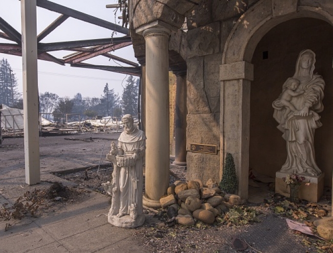 Religious statues are seen among fire-damaged buildings at Cardinal Newman High School Oct. 10 in Santa Rosa, California. Religious statues are seen among fire-damaged buildings at Cardinal Newman High School Oct. 10 in Santa Rosa, California.