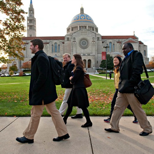Students from the Pontifical John Paul II Institute for Studies on Marriage and Family, on the campus of The Catholic University of America, walk past the Basilica of the National Shrine of the Immaculate Conception in Washington.
Students from the Pontifical John Paul II Institute for Studies on Marriage and Family, on the campus of The Catholic University of America, walk past the Basilica of the National Shrine of the Immaculate Conception in Washington.