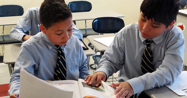 Students study at San Miguel School in Washington, DC. Photo courtesy of San Miguel School. Students study at San Miguel School in Washington, DC. Photo courtesy of San Miguel School.