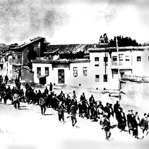 Armenians are marched to a nearby prison in Mezireh by armed Turkish soldiers. Kharpert, Armenia, Ottoman Empire, April, 1915 Armenians are marched to a nearby prison in Mezireh by armed Turkish soldiers. Kharpert, Armenia, Ottoman Empire, April, 1915