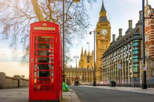 Street in London with Big Ben in the background. Street in London with Big Ben in the background.