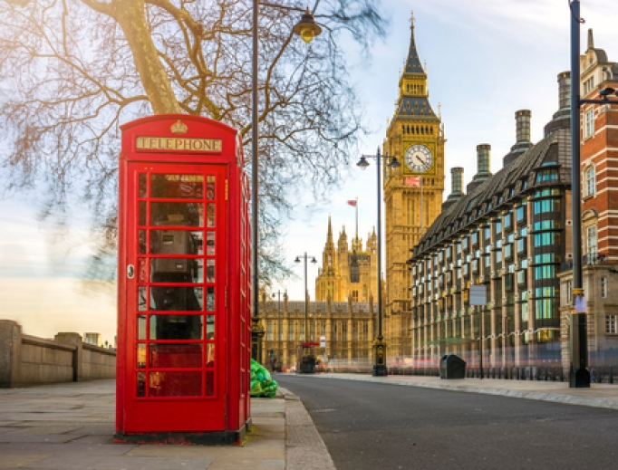 Street in London with Big Ben in the background. Street in London with Big Ben in the background.