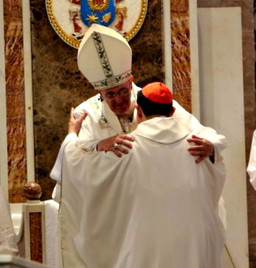Pope Francis and Cardinal Luis Antonio Tagle embrace at the close of Mass Jan. 16 in Manila. Pope Francis and Cardinal Luis Antonio Tagle embrace at the close of Mass Jan. 16 in Manila.
