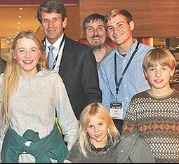 Members of the Wunderlich family with HSLDA founder Mike Farris (second from left). Members of the Wunderlich family with HSLDA founder Mike Farris (second from left).