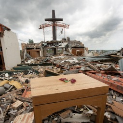 A wooden altar, a cross, some metal beams and pieces of a few cinder-block walls of St. Mary’s Catholic Church in Joplin, Mo., are all that are left standing May 25. The church, rectory, school and parish hall were destroyed by a massive F-5 tornado May 22. As of early May 26, the number of those killed by the tornado totaled 125. A wooden altar, a cross, some metal beams and pieces of a few cinder-block walls of St. Mary’s Catholic Church in Joplin, Mo., are all that are left standing May 25. The church, rectory, school and parish hall were destroyed by a massive F-5 tornado May 22. As of early May 26, the number of those killed by the tornado totaled 125.