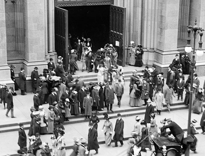 Above, Worshippers exit St. Patrick’s Cathedral in New York on Easter 1910. Below, a 1914-15 baptismal registry is among those being newly archived. Above, Worshippers exit St. Patrick’s Cathedral in New York on Easter 1910. Below, a 1914-15 baptismal registry is among those being newly archived.