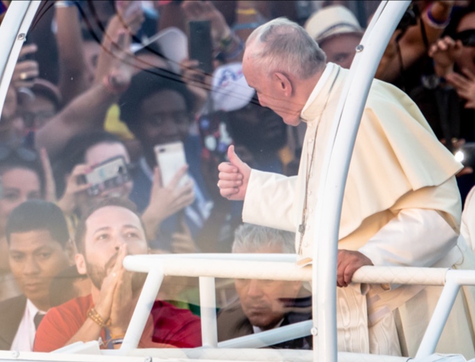 Pope Francis gestures approvingly to participants at the Jan. 26 Vigil ceremony and Eucharistic adoration with young people in Panama City's Campo San Juan Pablo II. Pope Francis gestures approvingly to participants at the Jan. 26 Vigil ceremony and Eucharistic adoration with young people in Panama City's Campo San Juan Pablo II.