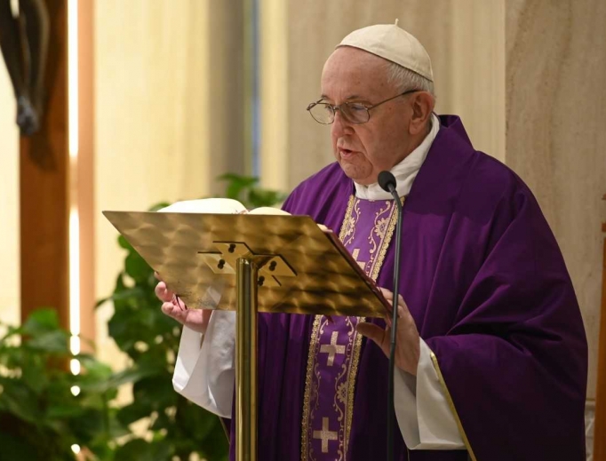 Pope Francis reads the Gospel during Mass at Casa Santa Marta on April 2, 2020. Pope Francis reads the Gospel during Mass at Casa Santa Marta on April 2, 2020.
