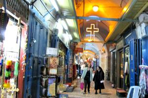 Christian shopkeepers in the Old City of Jerusalem say tourism is way down. The alleyways leading to the Church of the Holy Sepulcher are much less crowded than usual at this time of year.
Christian shopkeepers in the Old City of Jerusalem say tourism is way down. The alleyways leading to the Church of the Holy Sepulcher are much less crowded than usual at this time of year.