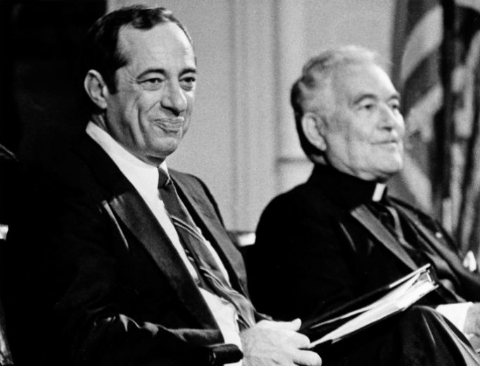 Holy Cross Father Theodore Hesburgh, the president of the University of Notre Dame, sits with New York Gov. Mario Cuomo, left, prior to Cuomo's lecture to students at the Notre Dame campus in South Bend, Indiana, Sept. 13, 1984. Holy Cross Father Theodore Hesburgh, the president of the University of Notre Dame, sits with New York Gov. Mario Cuomo, left, prior to Cuomo's lecture to students at the Notre Dame campus in South Bend, Indiana, Sept. 13, 1984.