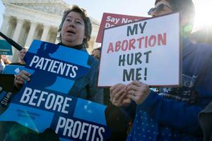 Pro-life activists participate in a rally outside of the Supreme Court as the justices hear oral arguments in the June Medical Services v. Russo case Wednesday in Washington. The Louisiana abortion case is the first major abortion case to make it to the Supreme Court since Donald Trump became president. Pro-life activists participate in a rally outside of the Supreme Court as the justices hear oral arguments in the June Medical Services v. Russo case Wednesday in Washington. The Louisiana abortion case is the first major abortion case to make it to the Supreme Court since Donald Trump became president.