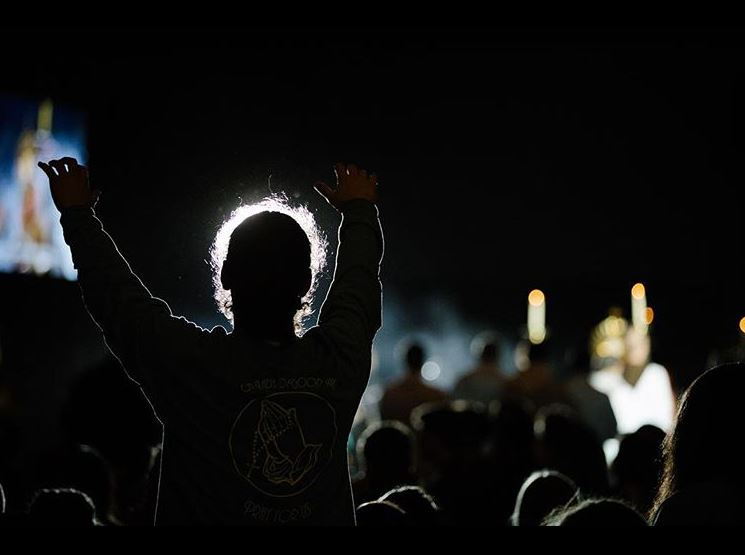 Young people attend adoration at 'SEEK 2019.' Young people attend adoration at 'SEEK 2019.'