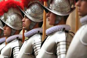 The Swiss Guard swearing-in ceremony on May 6 at St. Damaso Courtyard of the Vatican’s apostolic palace. The Swiss Guard swearing-in ceremony on May 6 at St. Damaso Courtyard of the Vatican’s apostolic palace.