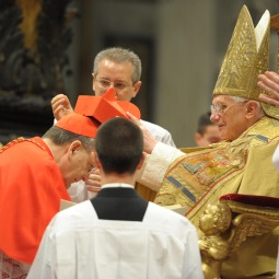 AUSPICIOUS DAY. Pope Benedict XVI
bestows a red biretta, a four-cornered hat,
on the head of new Cardinal Raymond Burke
of the United States during a consistory
ceremony in St. Peter’s Basilica. Twenty-two
men will receive the red hat Feb. 18.
AUSPICIOUS DAY. Pope Benedict XVI
bestows a red biretta, a four-cornered hat,
on the head of new Cardinal Raymond Burke
of the United States during a consistory
ceremony in St. Peter’s Basilica. Twenty-two
men will receive the red hat Feb. 18.