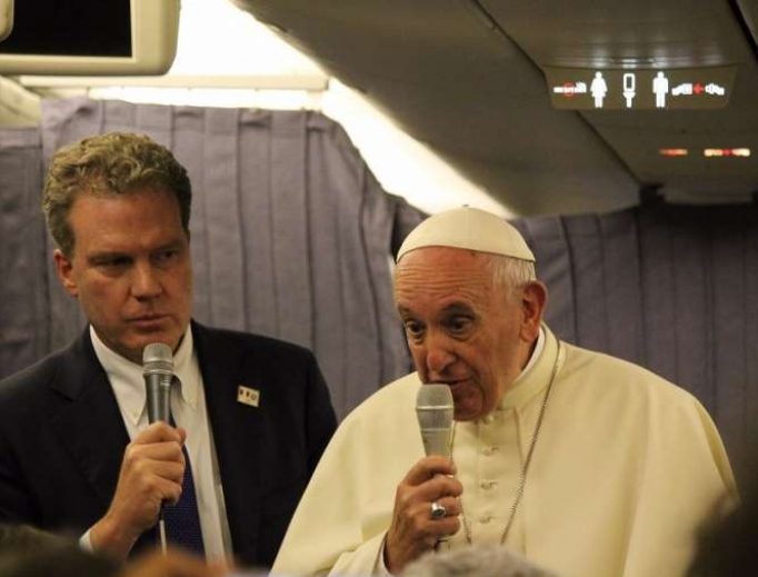 Pope Francis speaks aboard the papal plane from Lima, Peru, to Rome Jan. 22.
Pope Francis speaks aboard the papal plane from Lima, Peru, to Rome Jan. 22.