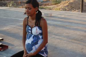 A young woman in Oaxaca, Mexico, 8 months pregnant. A young woman in Oaxaca, Mexico, 8 months pregnant.