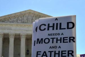 Defenders of marriage join rallies in front of the Supreme Court building during oral arguments over the definition of marriage in Washington on April 28. Defenders of marriage join rallies in front of the Supreme Court building during oral arguments over the definition of marriage in Washington on April 28.
