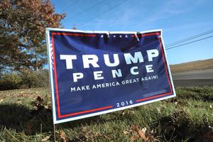 A campaign sign showing support for President-elect Donald Trump sits along a rural highway on Nov. 9 near Belvidere, Illinois. Below, Trump and his campaign manager, Kellyanne Conway, a Catholic. A campaign sign showing support for President-elect Donald Trump sits along a rural highway on Nov. 9 near Belvidere, Illinois. Below, Trump and his campaign manager, Kellyanne Conway, a Catholic.