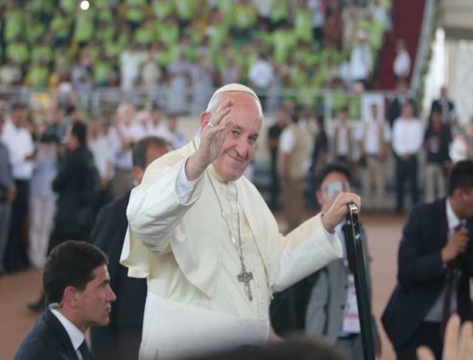 Pope Francis greets the faithful during his apostolic trip to the Amazon, 2019. Pope Francis greets the faithful during his apostolic trip to the Amazon, 2019.