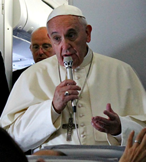Pope Francis speaks with journalists aboard the plane from Manila to Rome on Jan. 19. Pope Francis speaks with journalists aboard the plane from Manila to Rome on Jan. 19.