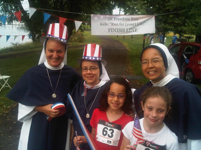 Sisters of Life with race participants. Sisters of Life with race participants.