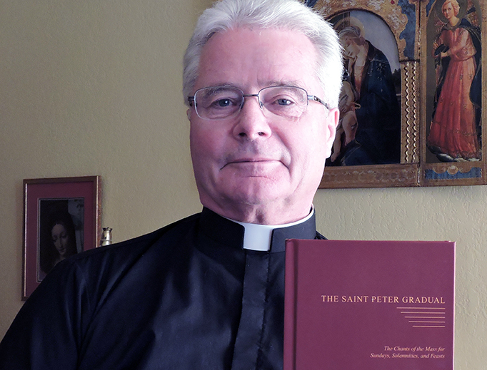 Fr. Carl Reid holds the new St. Peter Gradual Fr. Carl Reid holds the new St. Peter Gradual