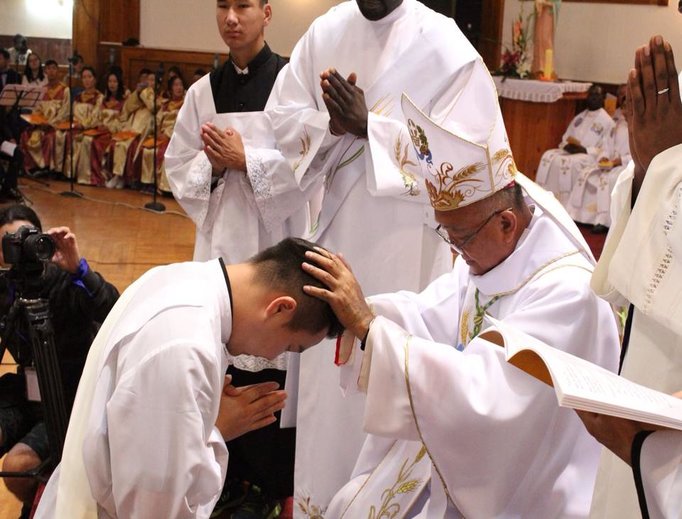 Above, Bishop Wenceslao Selga Padilla ordains Father Joseph Enkh-Baatar; below, Father Enkh-Baatar offers blessings. Above, Bishop Wenceslao Selga Padilla ordains Father Joseph Enkh-Baatar; below, Father Enkh-Baatar offers blessings.