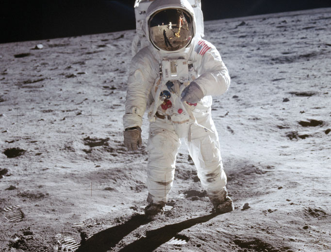 Above, Neil Armstrong (reflected in visor) and Edwin ‘Buzz’ Aldrin (in spacesuit) set foot on the moon on July 20, 1969. Also seen below, the astronauts captured a beautiful image of Earth rising above the moon’s horizon from Apollo 11. Also below: the mission patch and other iconic moonshot photos, along with a solo photo of astronaut Armstrong. Bottom of page: All three Apollo 11 astronauts, Michael Collins (l) and Neil Armstrong (r) shown, and their wives attend an audience with Pope Paul VI in the Papal Library Oct. 16, 1969. Above, Neil Armstrong (reflected in visor) and Edwin ‘Buzz’ Aldrin (in spacesuit) set foot on the moon on July 20, 1969. Also seen below, the astronauts captured a beautiful image of Earth rising above the moon’s horizon from Apollo 11. Also below: the mission patch and other iconic moonshot photos, along with a solo photo of astronaut Armstrong. Bottom of page: All three Apollo 11 astronauts, Michael Collins (l) and Neil Armstrong (r) shown, and their wives attend an audience with Pope Paul VI in the Papal Library Oct. 16, 1969.