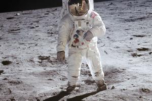 Above, Neil Armstrong (reflected in visor) and Edwin ‘Buzz’ Aldrin (in spacesuit) set foot on the moon on July 20, 1969. Also seen below, the astronauts captured a beautiful image of Earth rising above the moon’s horizon from Apollo 11. Also below: the mission patch and other iconic moonshot photos, along with a solo photo of astronaut Armstrong. Bottom of page: All three Apollo 11 astronauts, Michael Collins (l) and Neil Armstrong (r) shown, and their wives attend an audience with Pope Paul VI in the Papal Library Oct. 16, 1969. Above, Neil Armstrong (reflected in visor) and Edwin ‘Buzz’ Aldrin (in spacesuit) set foot on the moon on July 20, 1969. Also seen below, the astronauts captured a beautiful image of Earth rising above the moon’s horizon from Apollo 11. Also below: the mission patch and other iconic moonshot photos, along with a solo photo of astronaut Armstrong. Bottom of page: All three Apollo 11 astronauts, Michael Collins (l) and Neil Armstrong (r) shown, and their wives attend an audience with Pope Paul VI in the Papal Library Oct. 16, 1969.