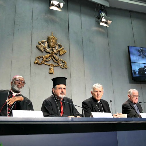 From left, Archbishop Charles Palmer-Buckle, Patriarch Ignace Youssif III Youman, Cardinal Edward Menichelli, and Father Federico Lombardi attend a press briefing during the Synod of Bishops on the Family at the Holy See Press Office on Oct. 7. From left, Archbishop Charles Palmer-Buckle, Patriarch Ignace Youssif III Youman, Cardinal Edward Menichelli, and Father Federico Lombardi attend a press briefing during the Synod of Bishops on the Family at the Holy See Press Office on Oct. 7.