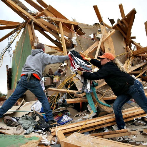 Volunteers help clean debris at the site of a home that was destroyed after a tornado April 29 in Vilonia, Ark. Deadly tornadoes ripped through the region April 27, leaving more than a dozen dead. Volunteers help clean debris at the site of a home that was destroyed after a tornado April 29 in Vilonia, Ark. Deadly tornadoes ripped through the region April 27, leaving more than a dozen dead.