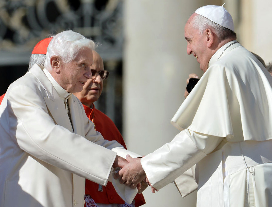 Pope Emeritus Benedict XVI speaks with Pope Francis during a Mass for elderly people in St. Peter's Square on Sept. 28, 2014.
Pope Emeritus Benedict XVI speaks with Pope Francis during a Mass for elderly people in St. Peter's Square on Sept. 28, 2014.